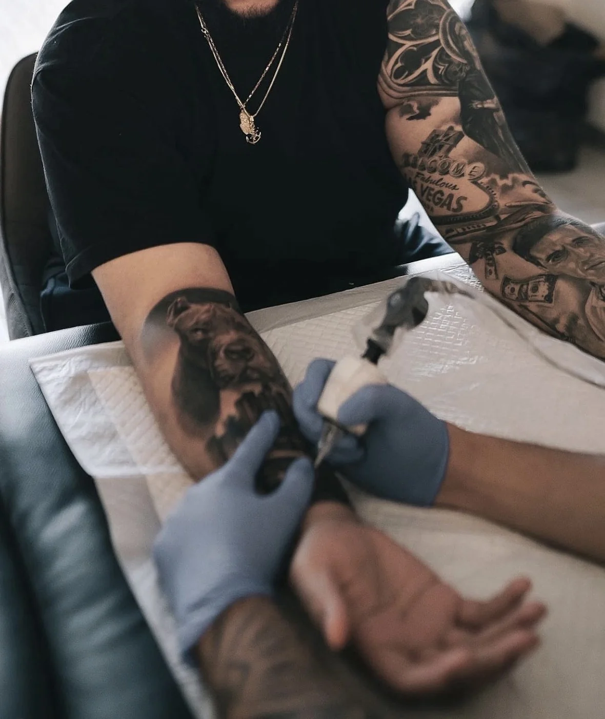 Detailed black and grey tattoo sleeve in progress